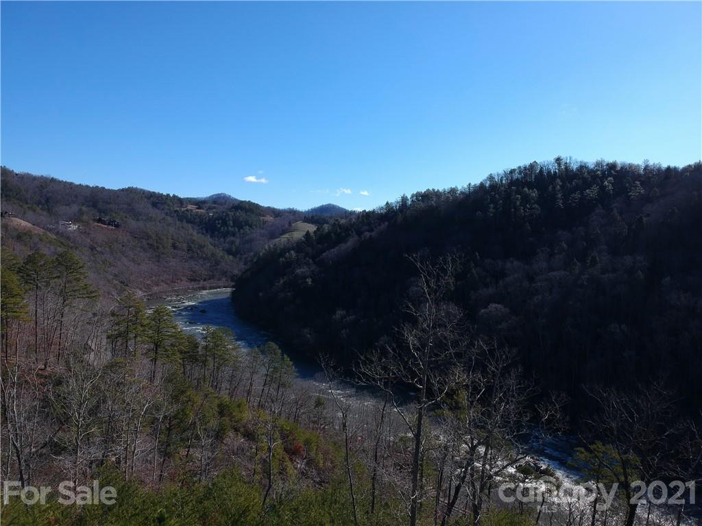 Enjoy daily sunrises with your morning coffee overlooking the beauty of the French Broad River! - 3477 French Broad Parkway, Marshall