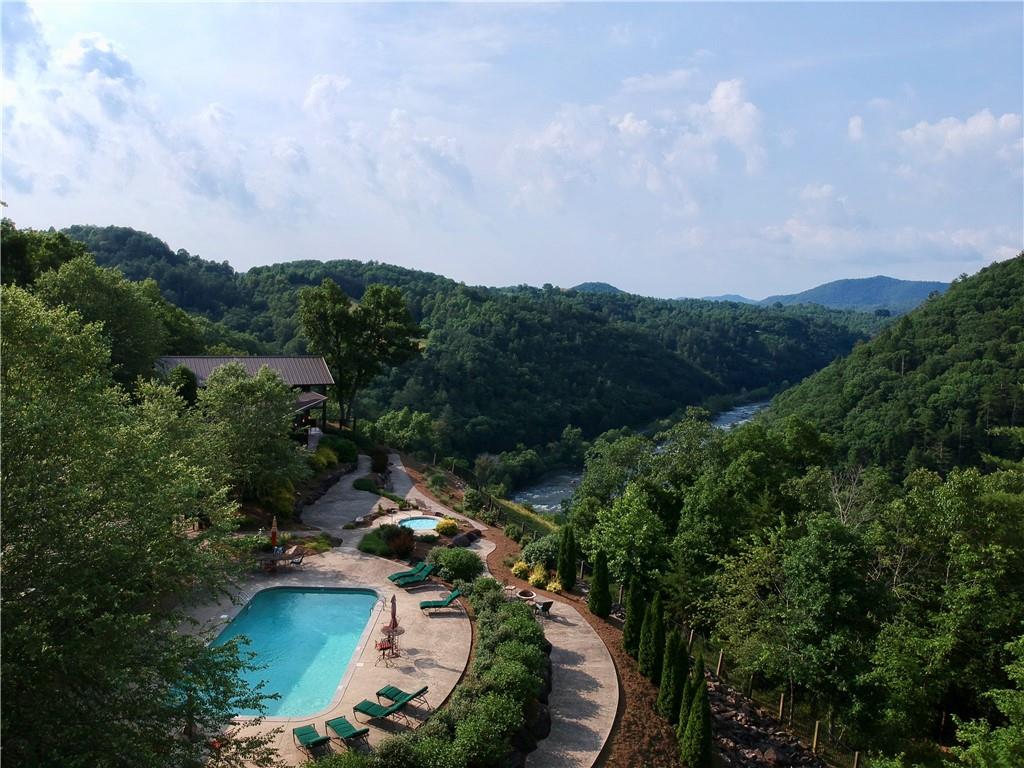 Relax by the pool while taking in the peaceful scenery! - 305 Raccoon Run, Marshall
