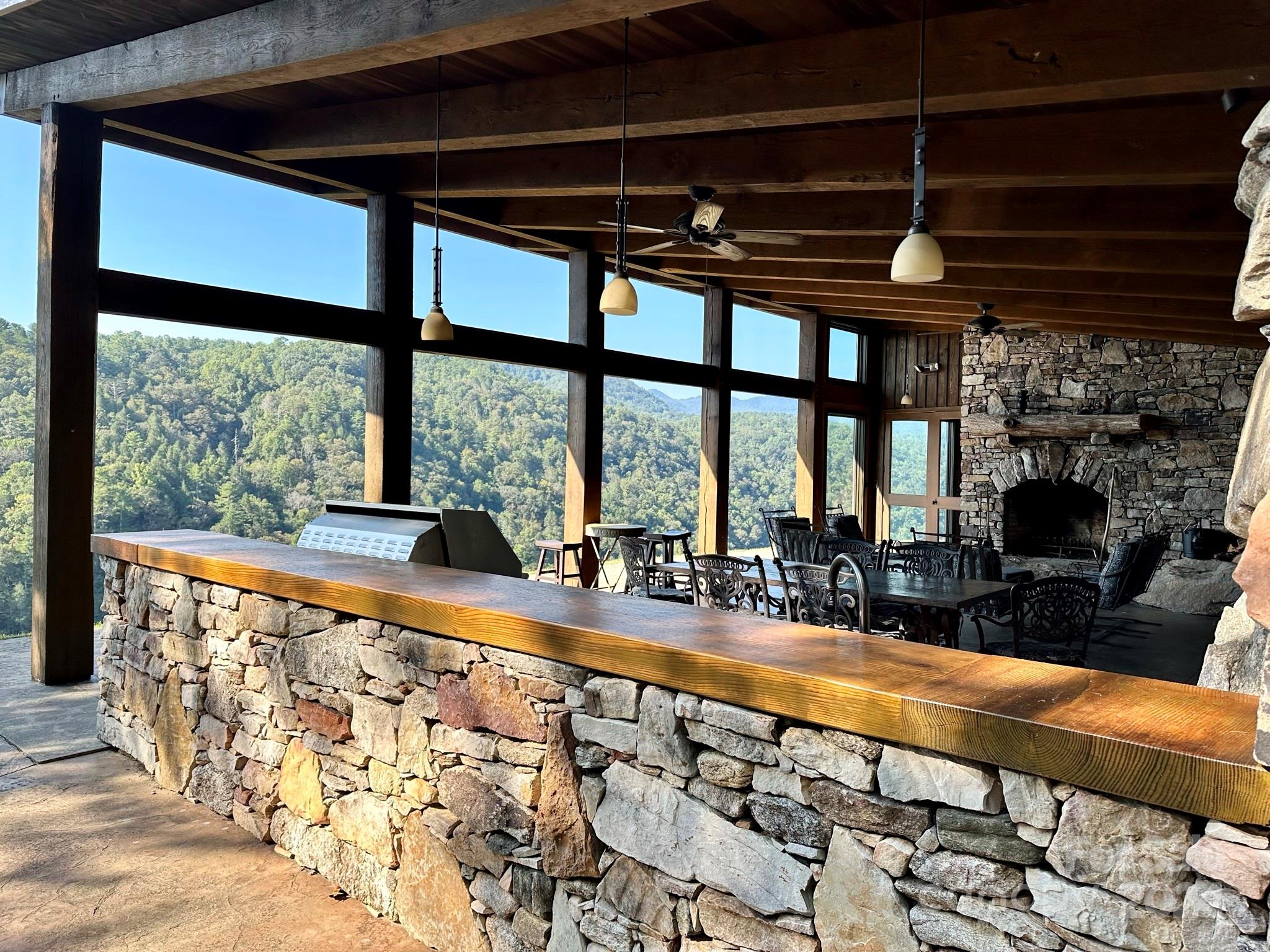 Grill, dine and enjoy the view! Gather around the fire for a relaxing evening. - 75 Raccoon Run, Marshall