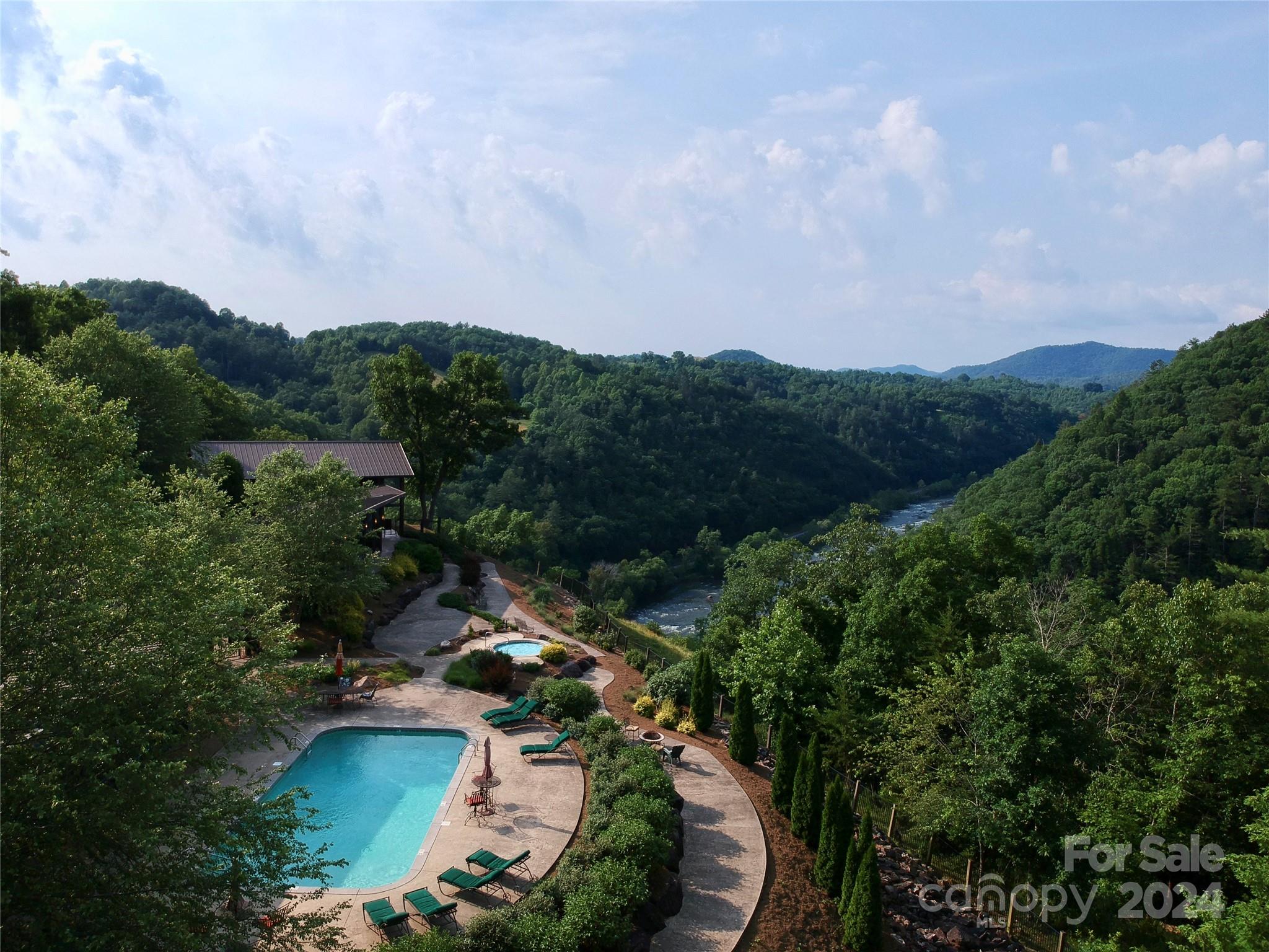 Relax at the River Lodge pool and hot tub with vast mountain and river views! - 387 Wild River Run, Marshall
