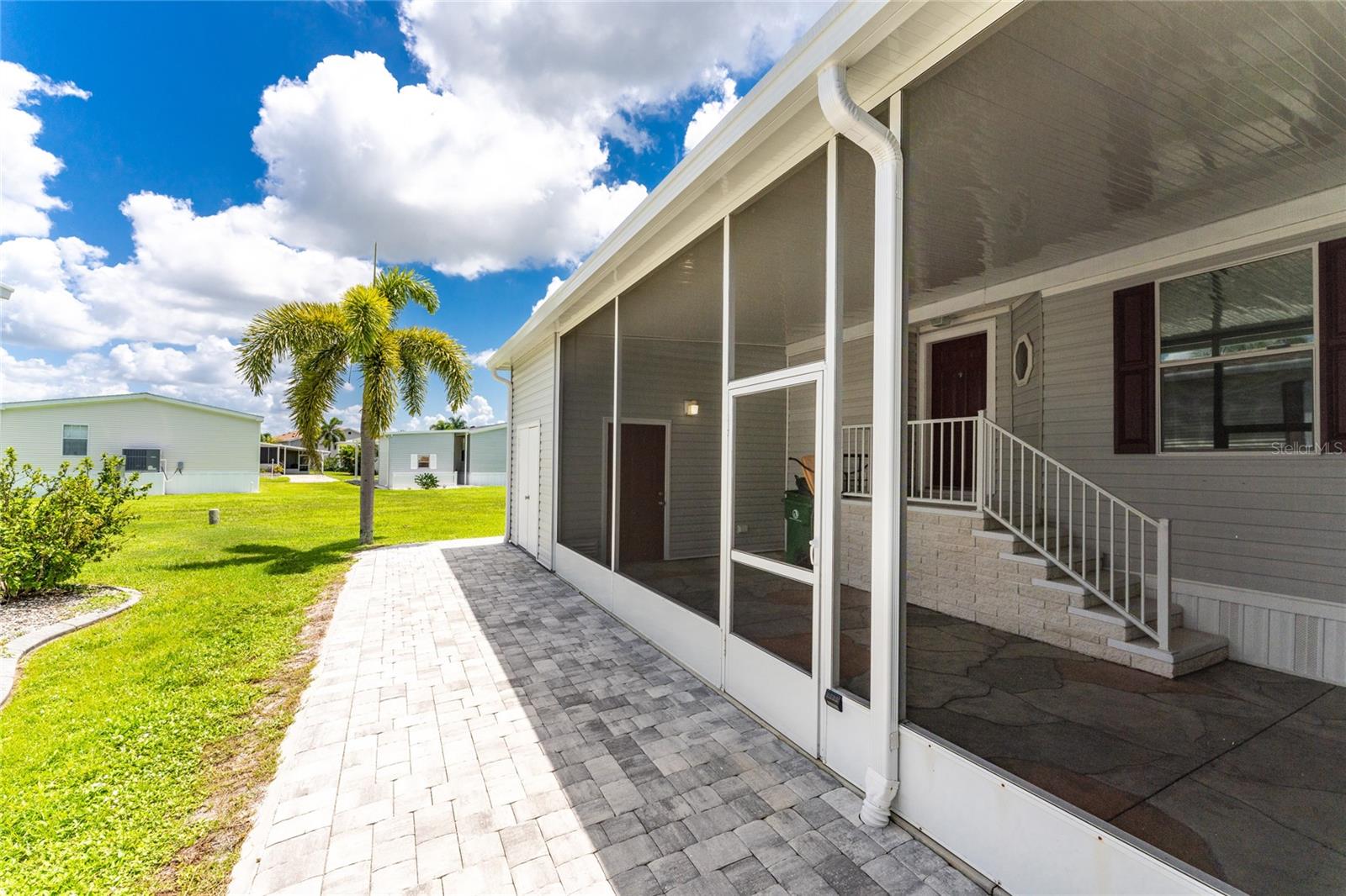 Manufactured Home at 63 WINDMILL BLVD #204O, PUNTA GORDA, photo 2 of 56