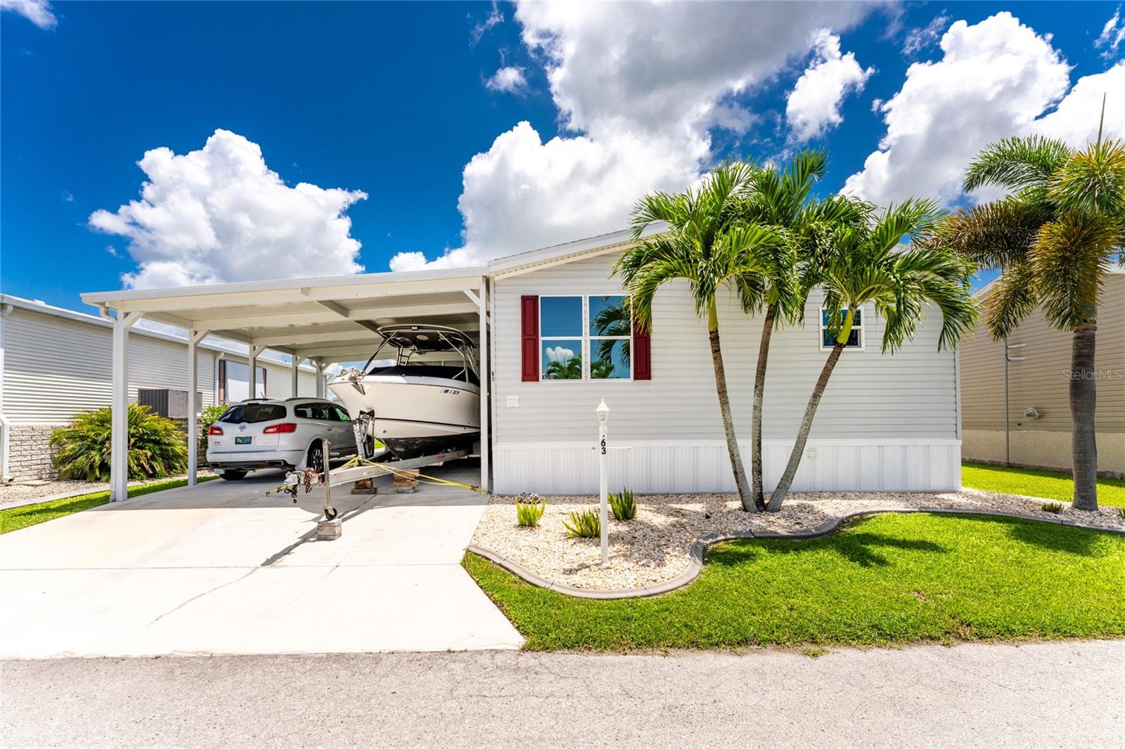 Manufactured Home at 63 WINDMILL BLVD #204O, PUNTA GORDA, photo 32 of 56