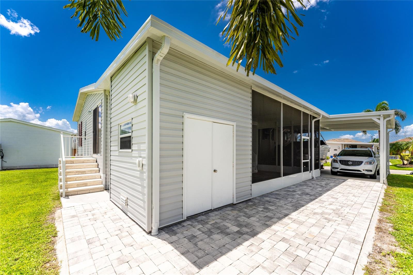 Manufactured Home at 63 WINDMILL BLVD #204O, PUNTA GORDA, photo 33 of 56