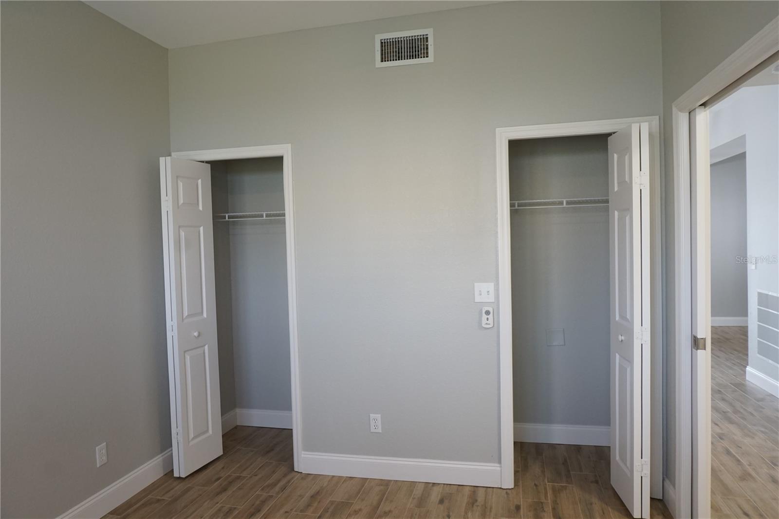 Front guest bedroom 2 with double closets - 2000 BAL HARBOR BLVD #1012, PUNTA GORDA