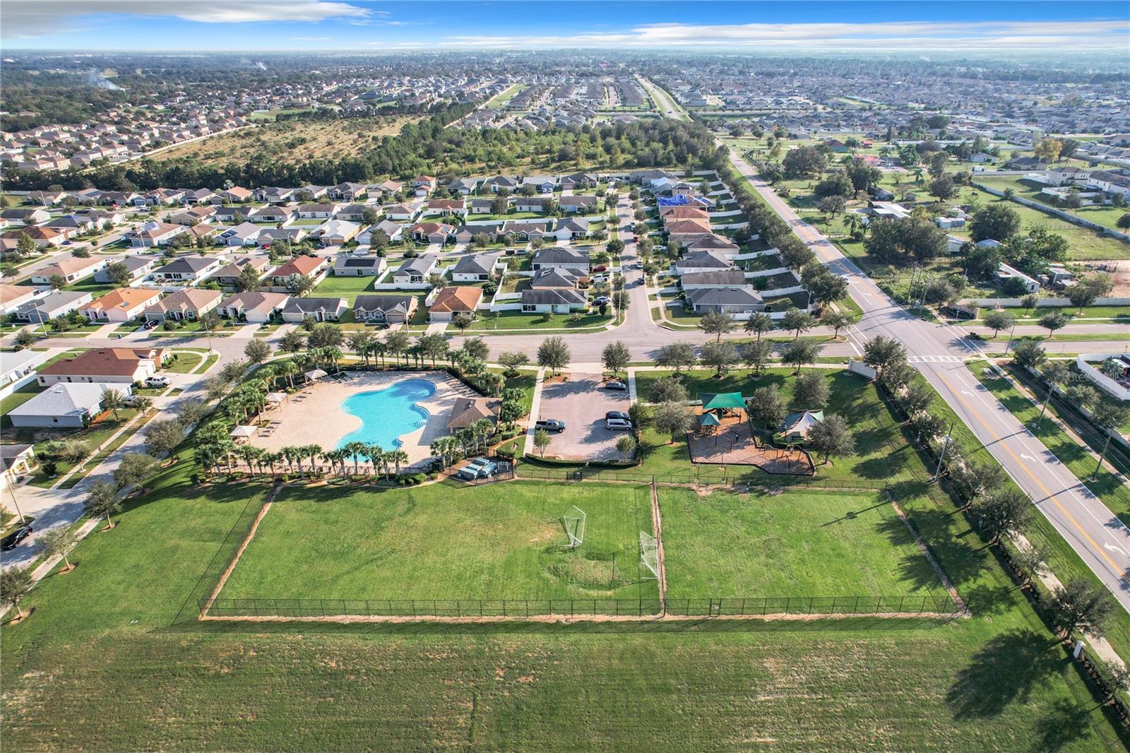 COMMUNITY POOL, SOCCER FIELD AND PLAYGROUND - 653 PERSIAN DR, HAINES CITY