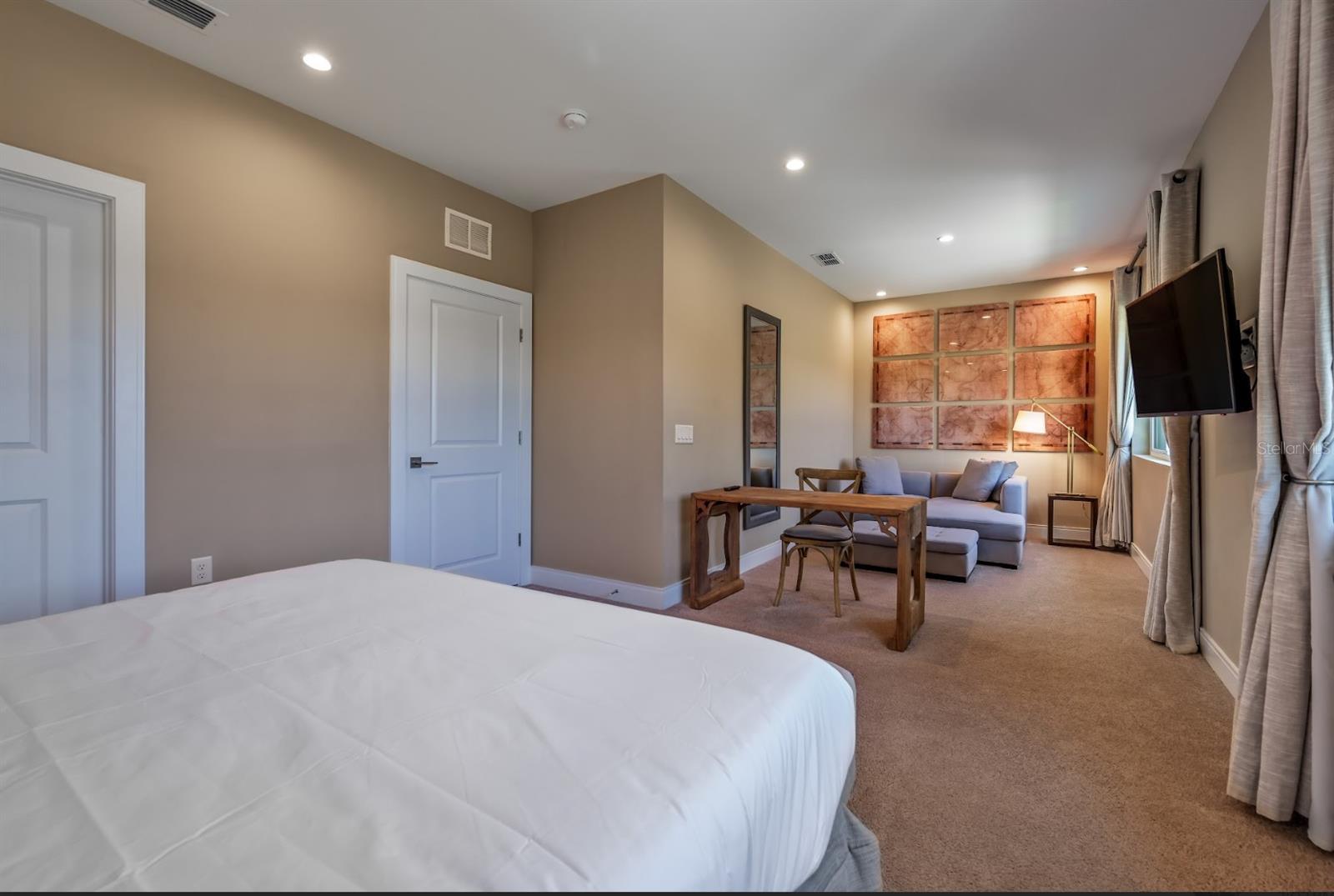 Primary Bedroom Private Quite Sitting Space with Work Desk - 7482 BROOKLYN DR, KISSIMMEE