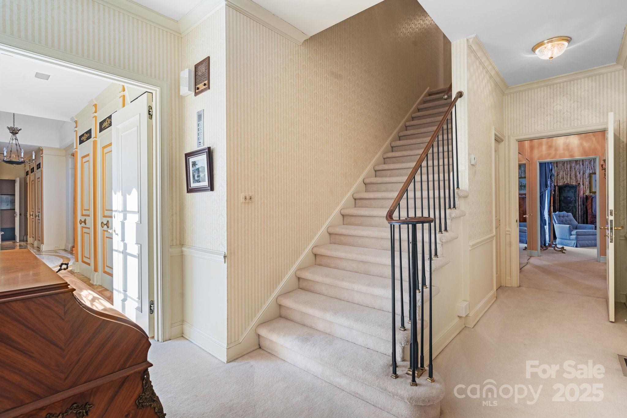 Hall to 2nd Primary Bedroom & Stairs to 2nd Level - 135 Claron Place SE, Lenoir