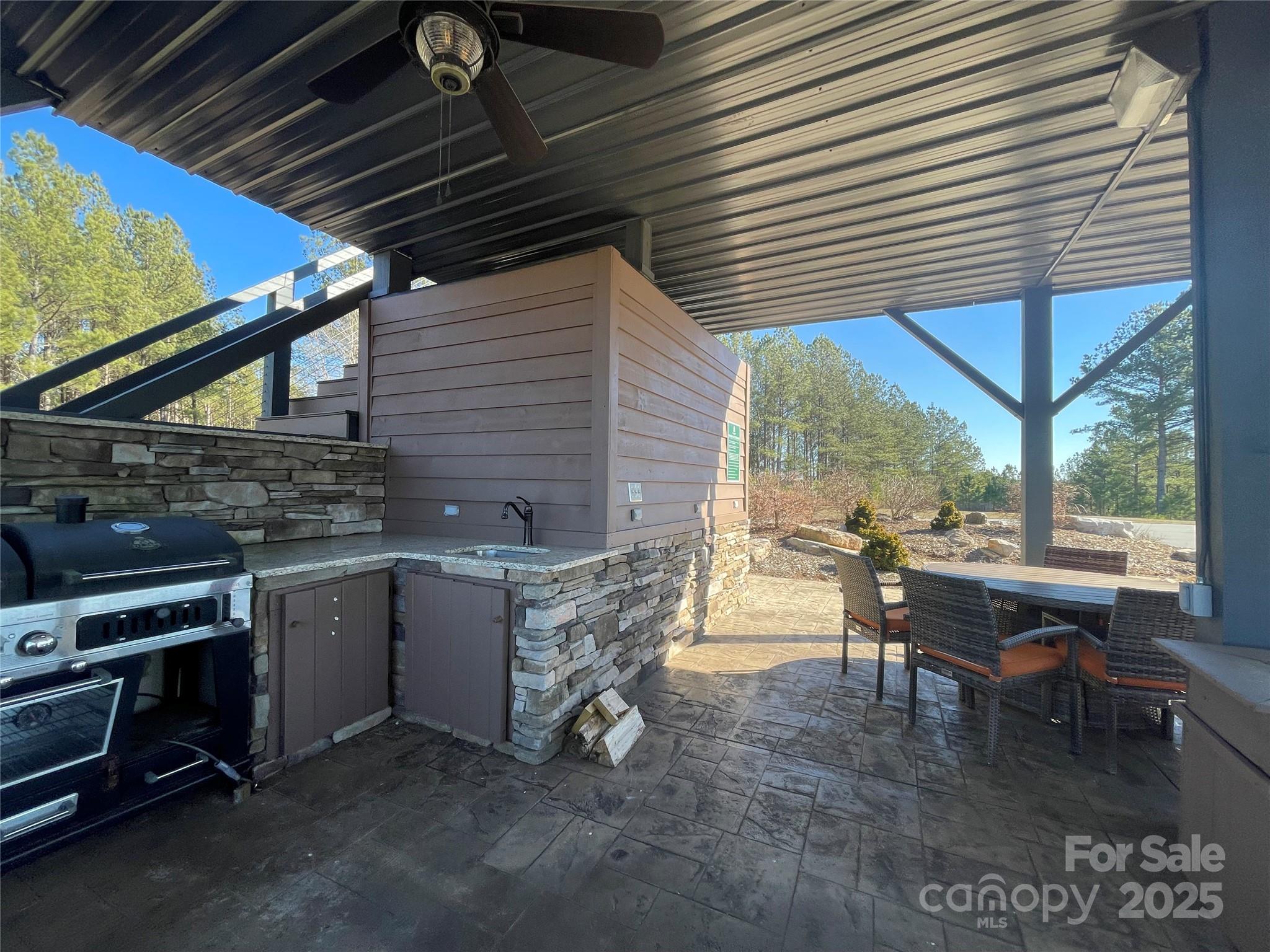 Grill location with underneath sitting area. - 109 Shortoff Trail, Valdese