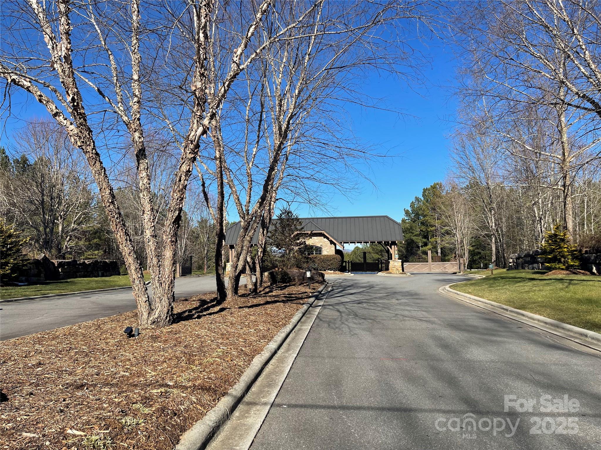 Main entrance with gated access. - 109 Shortoff Trail, Valdese