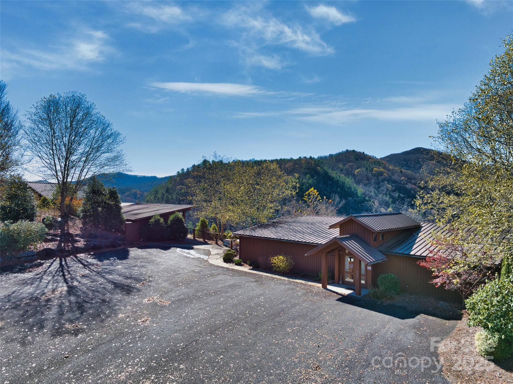 Clubhouse and fitness center overlooking the French Broad River and the mountains beyond - 181 Red Fox Trail, Marshall
