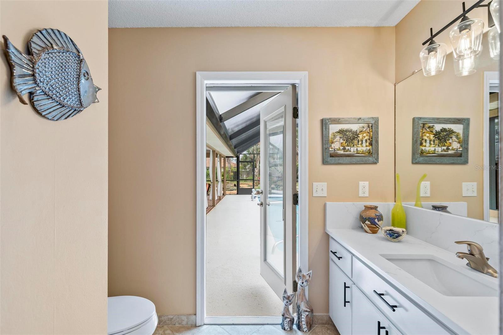 Bathroom 2 - opens to pool - 130 BAYSIDE DR, PALM COAST