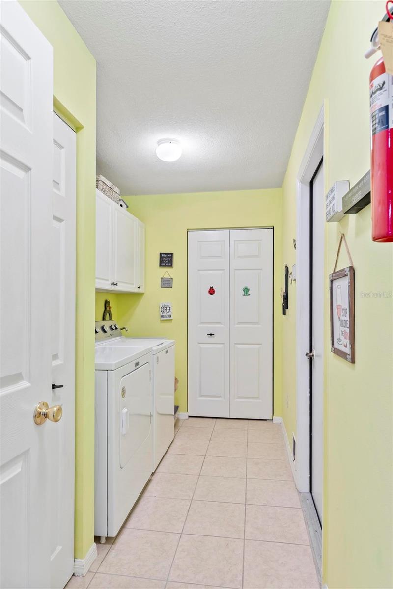 Laundry room w 2 closets + cabinets - 130 BAYSIDE DR, PALM COAST