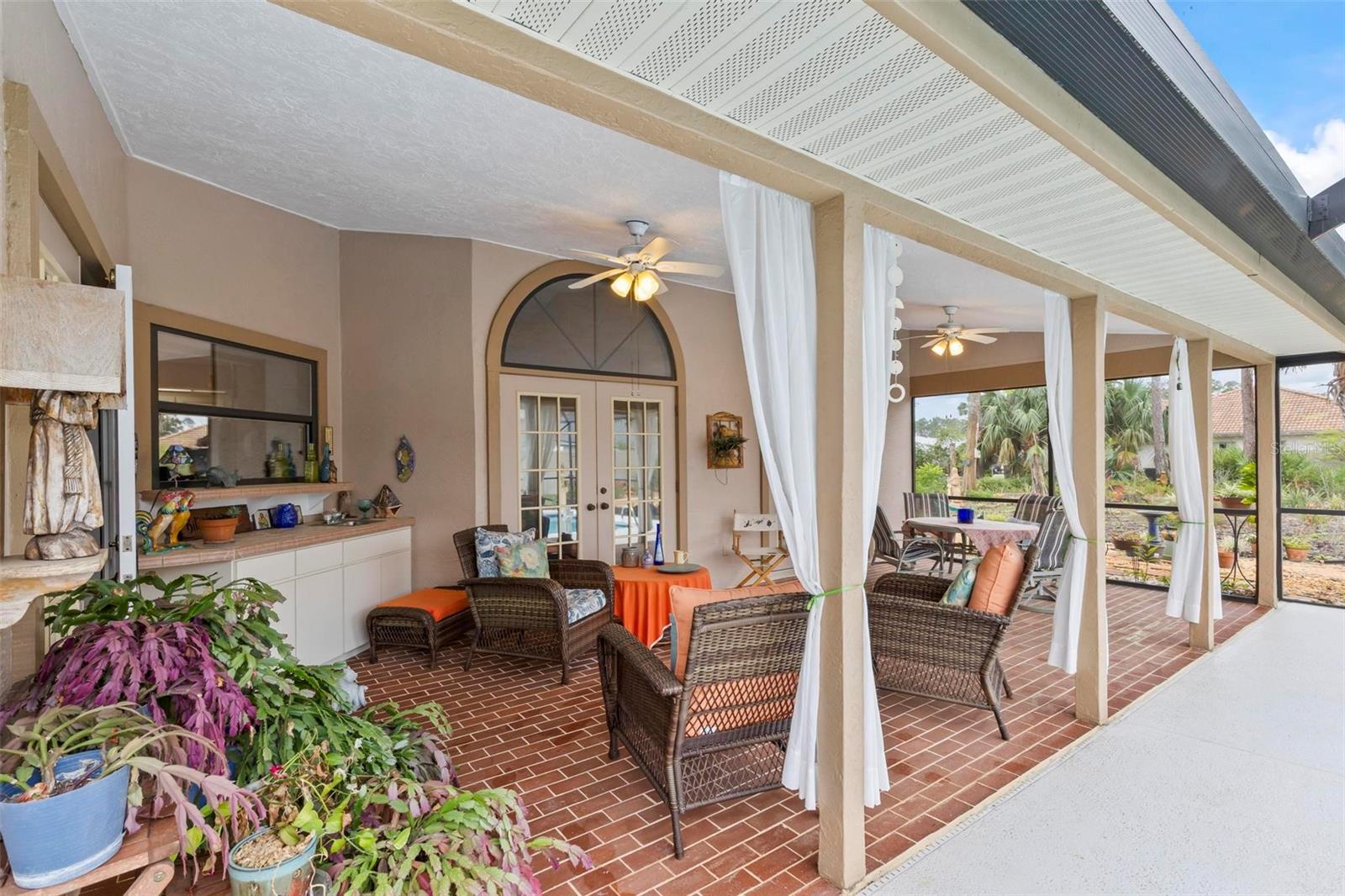 Generously sized covered porch - 130 BAYSIDE DR, PALM COAST