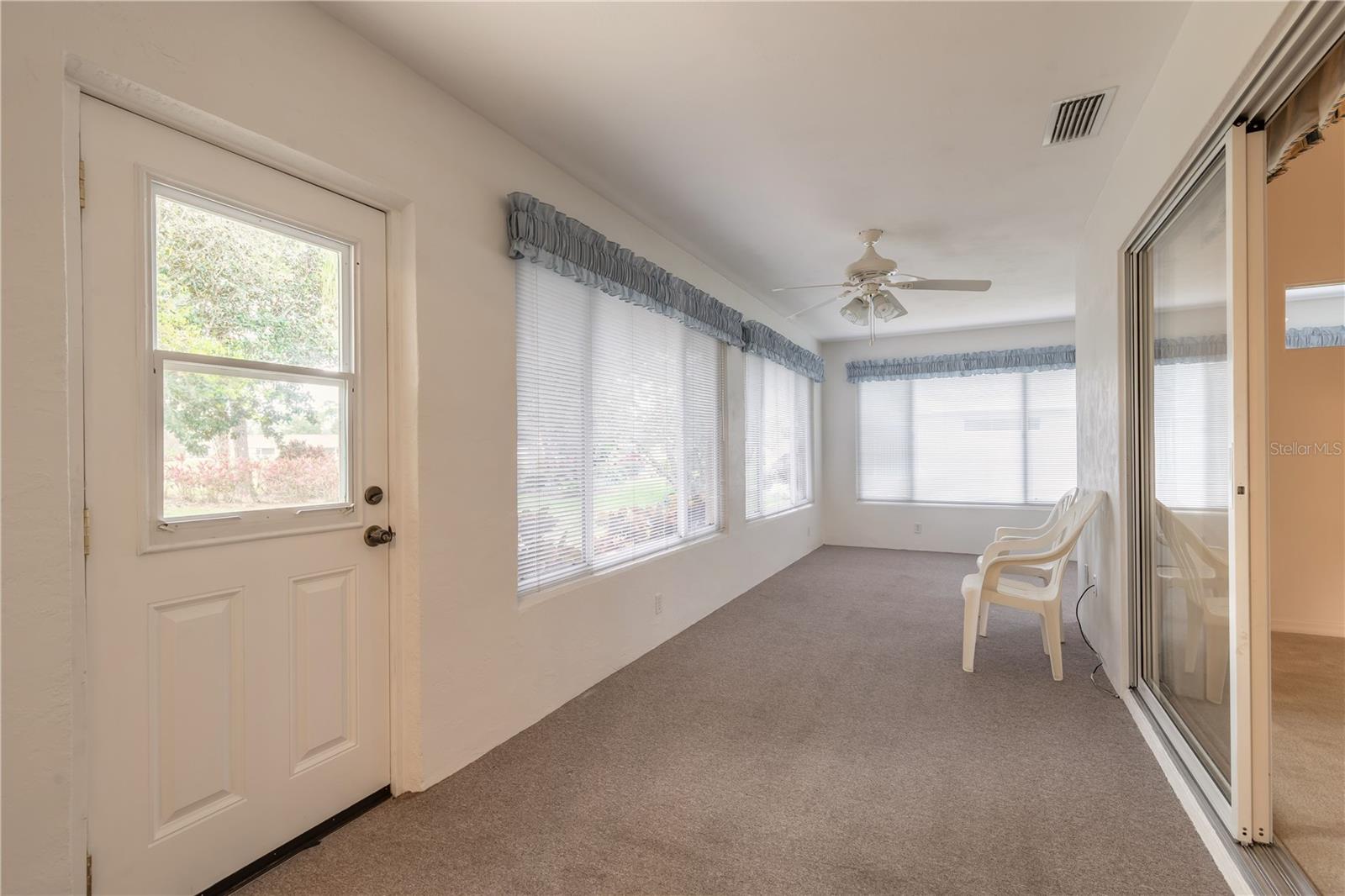 Florida room designed with entertaining in mind - 2626 TURNBULL ESTATES DR, NEW SMYRNA BEACH