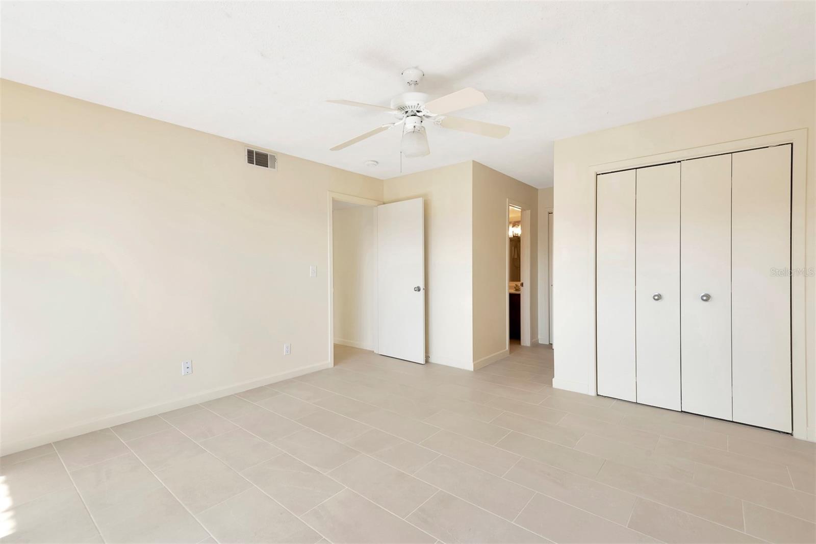 Primary Bedroom - 48 CLUB HOUSE DR #106, PALM COAST