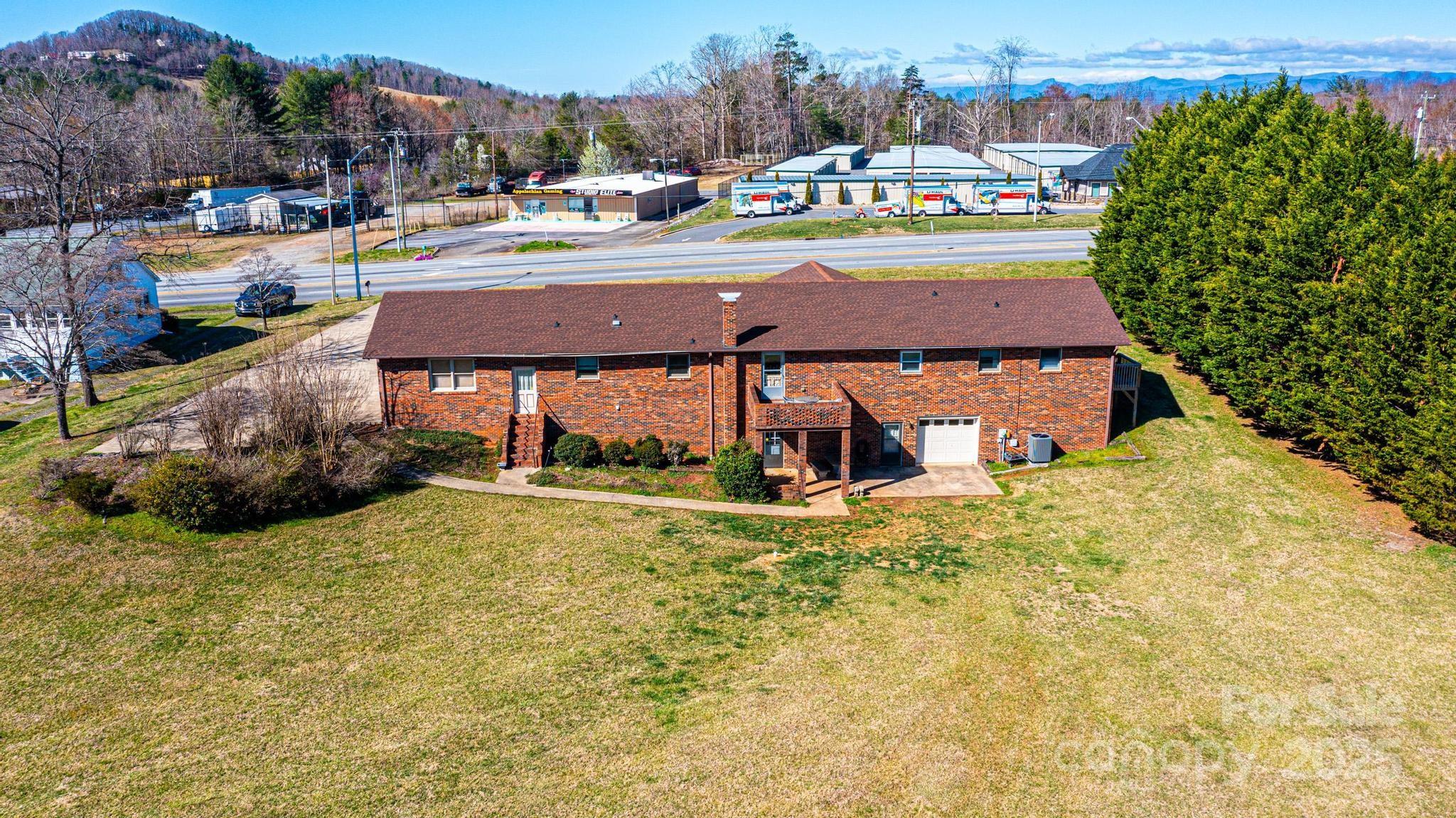 Single Family Residence at 1221 Connelly Springs Road, Lenoir, photo 3 of 42