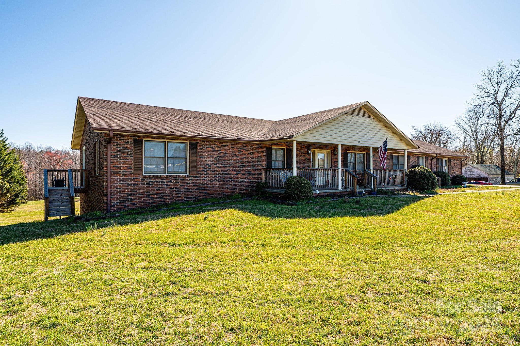 Single Family Residence at 1221 Connelly Springs Road, Lenoir, photo 6 of 42