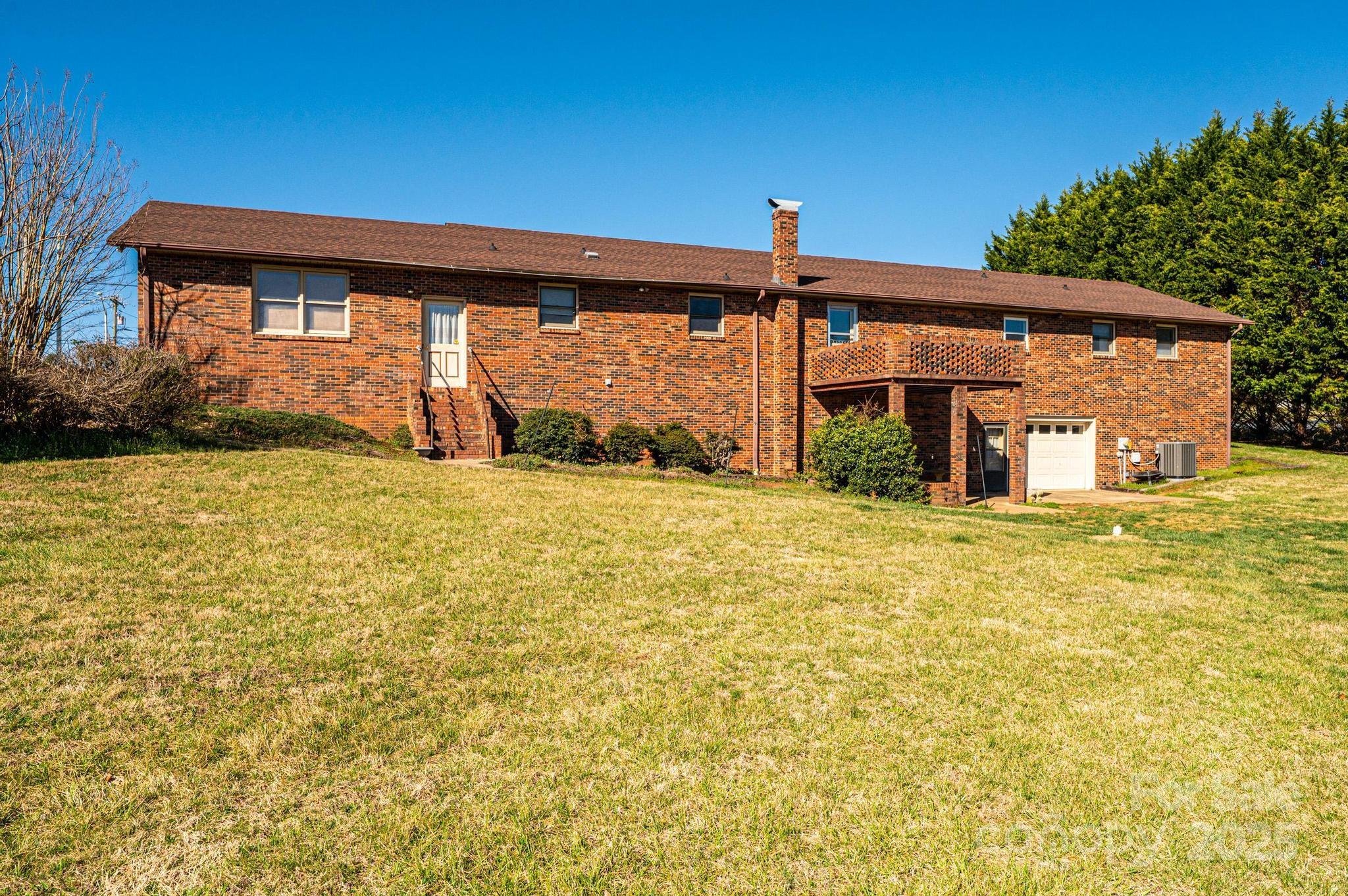 Single Family Residence at 1221 Connelly Springs Road, Lenoir, photo 11 of 42