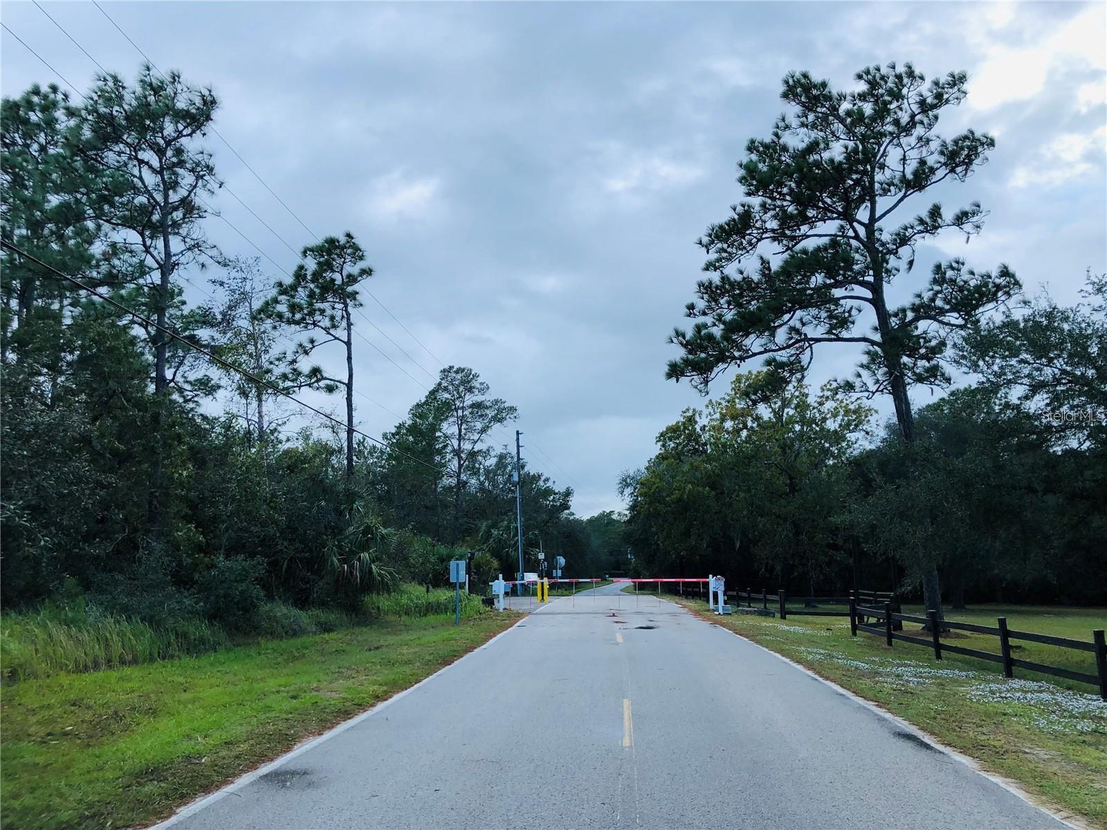 Leaving the Community, through the gated exit on N Goodman. - KEEFER TRL, KISSIMMEE