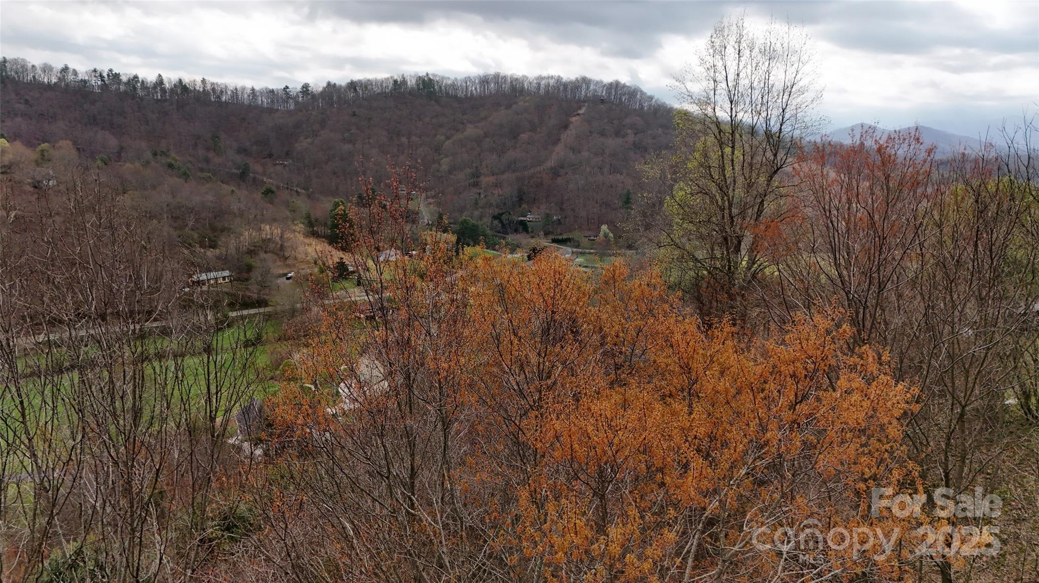 Drone view above the center of the lot - 380 Serenity Mountain Lane, Mars Hill