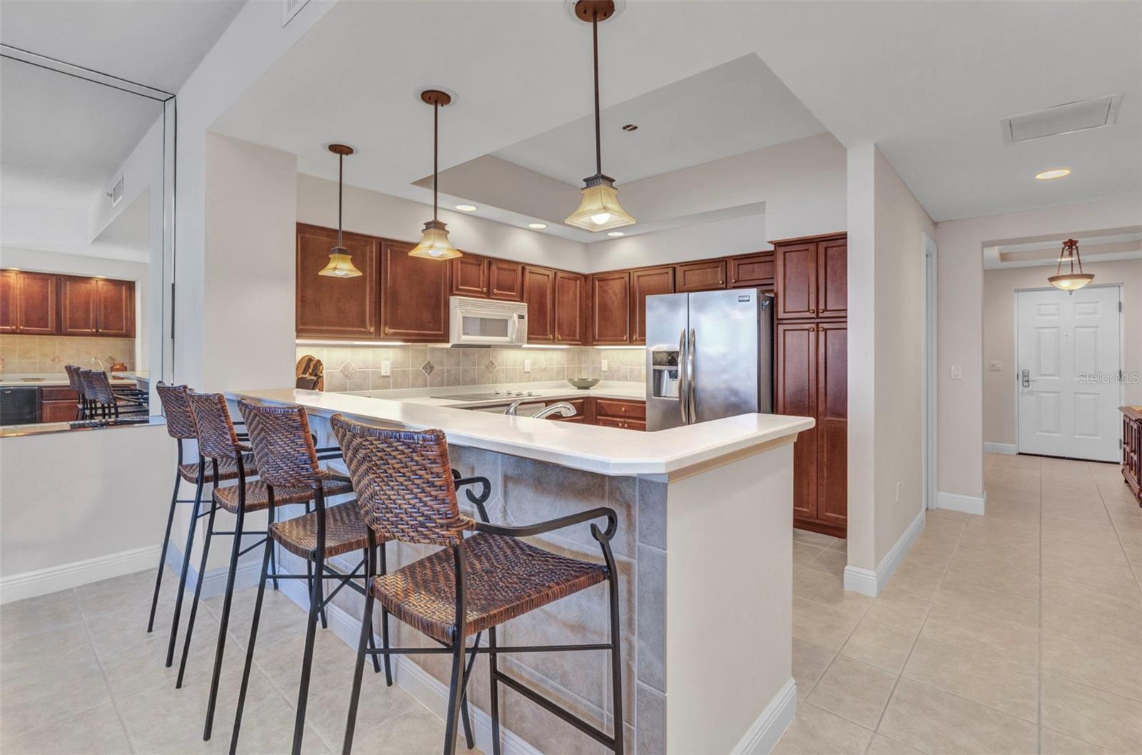 Gorgeous kitchen, tons of cabinet space plus full cabinet pantry - 3321 SUNSET KEY CIR #502, PUNTA GORDA