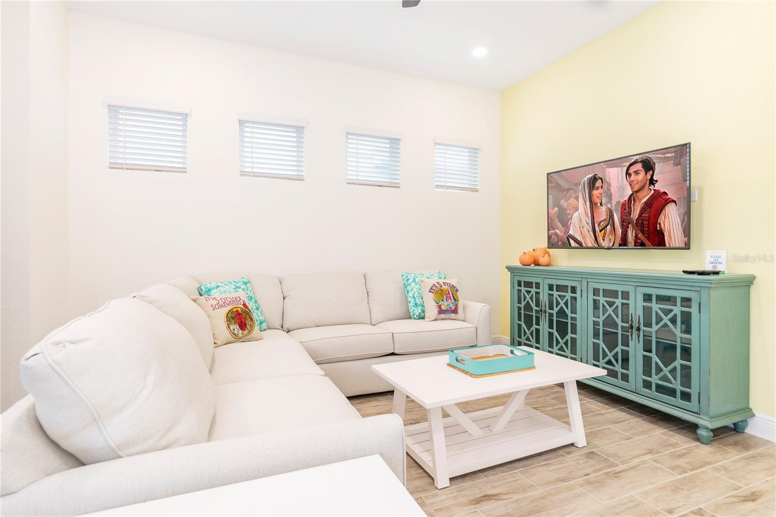 Bright living room with natural light in Margaritaville Resort Orlando near Walt Disney World - 2988 SALTED RIM RD, KISSIMMEE