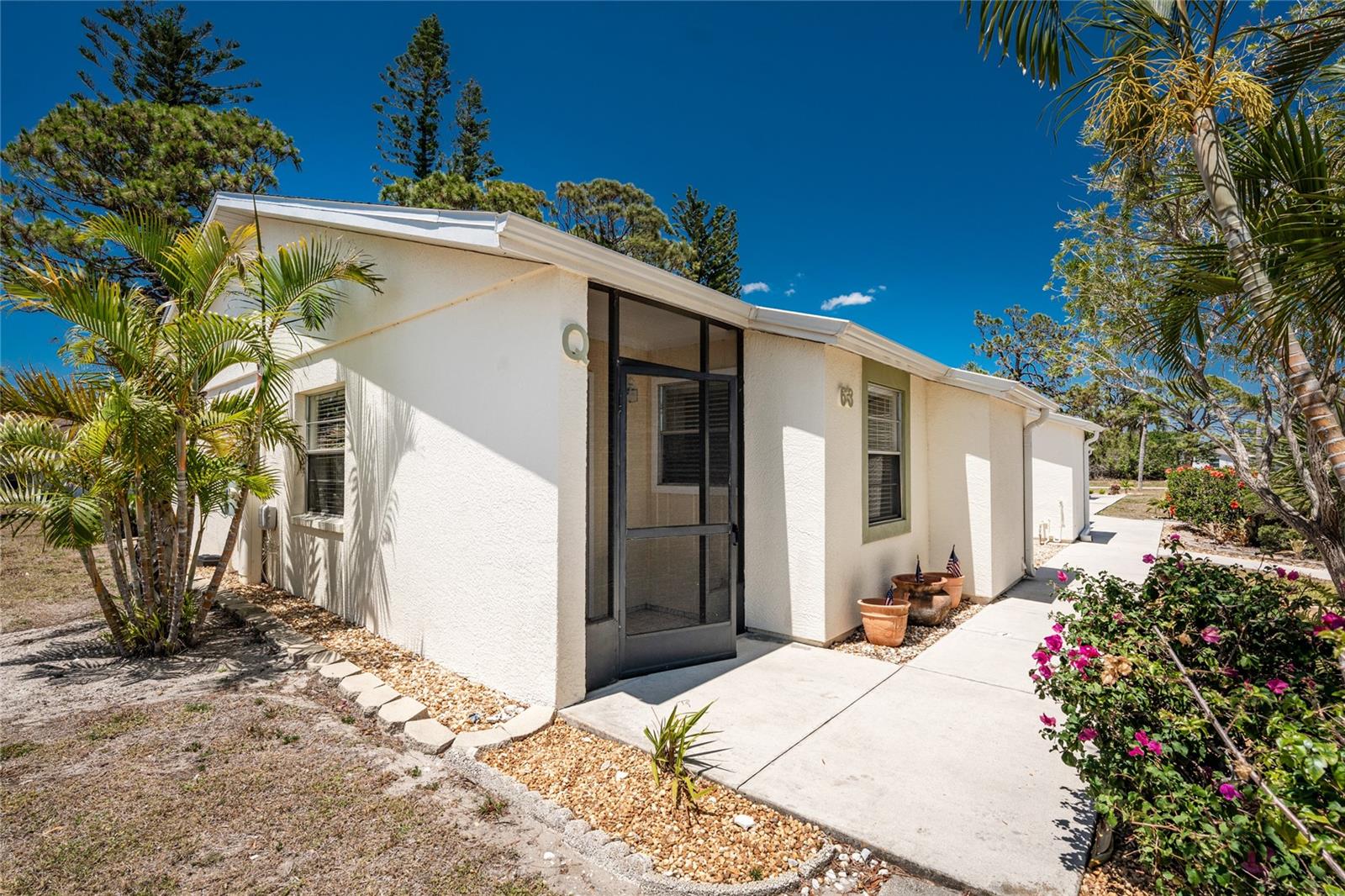End unit means an extra window and more sunshine! - 6796 GASPARILLA PINES BLVD #63, ENGLEWOOD