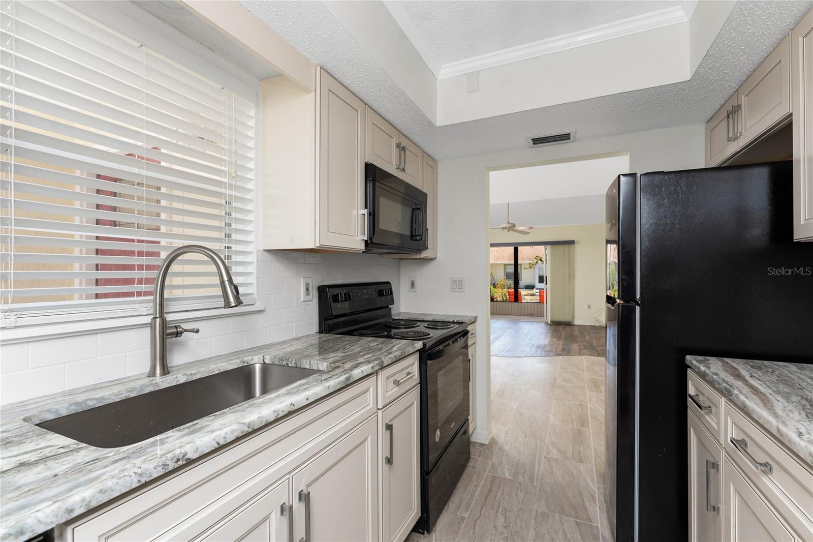 Deep sink makes it easy to do large pots and pans! - 6796 GASPARILLA PINES BLVD #63, ENGLEWOOD