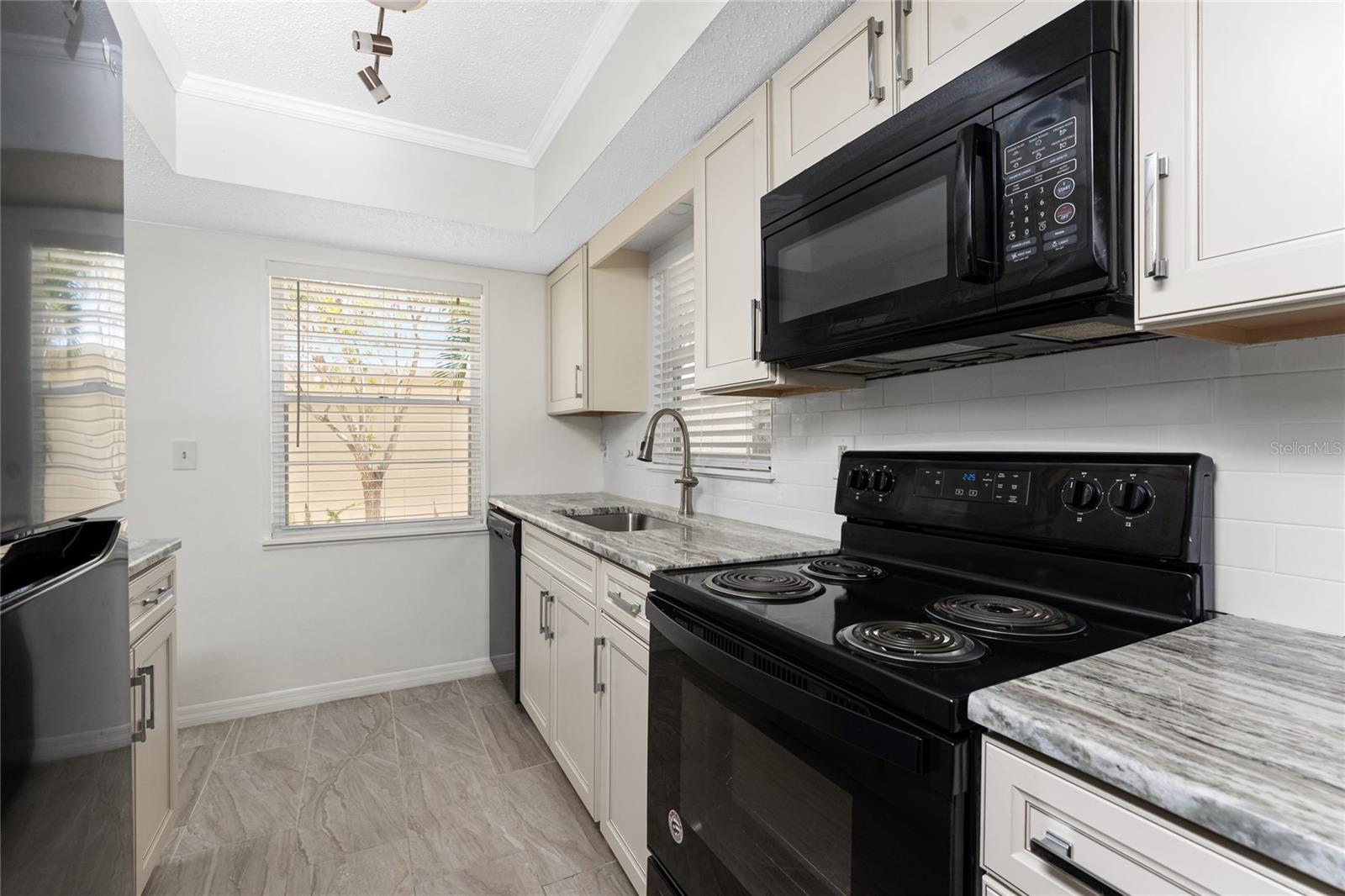 Track lighting provided plenty of light - 6796 GASPARILLA PINES BLVD #63, ENGLEWOOD