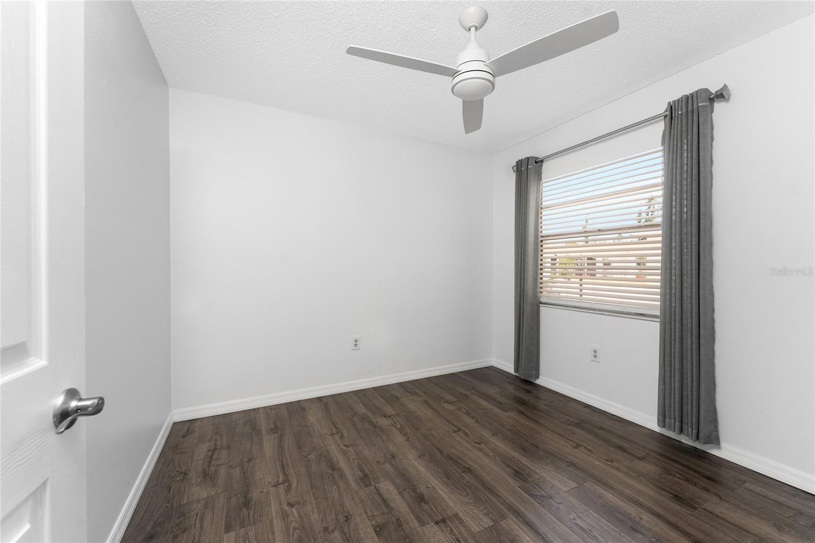 Guest bedroom has laminate flooring - 6796 GASPARILLA PINES BLVD #63, ENGLEWOOD