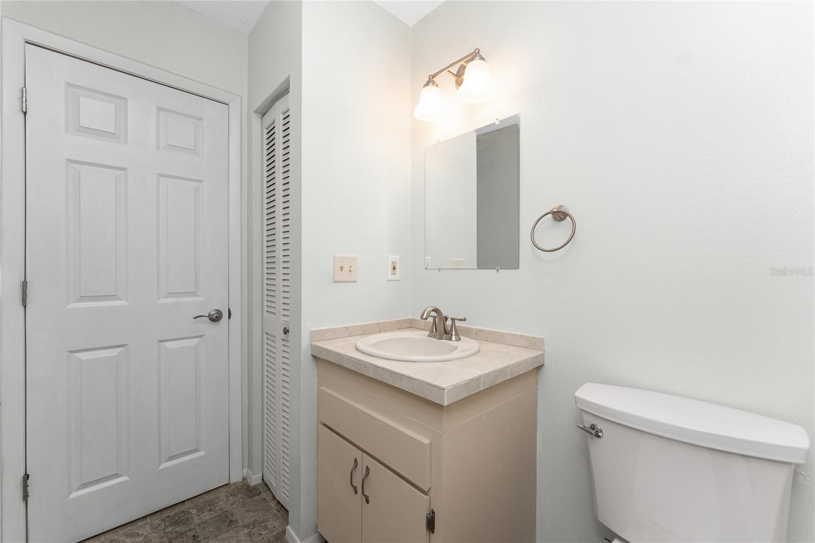 Linen closet in Guest bath provides additional storage - 6796 GASPARILLA PINES BLVD #63, ENGLEWOOD