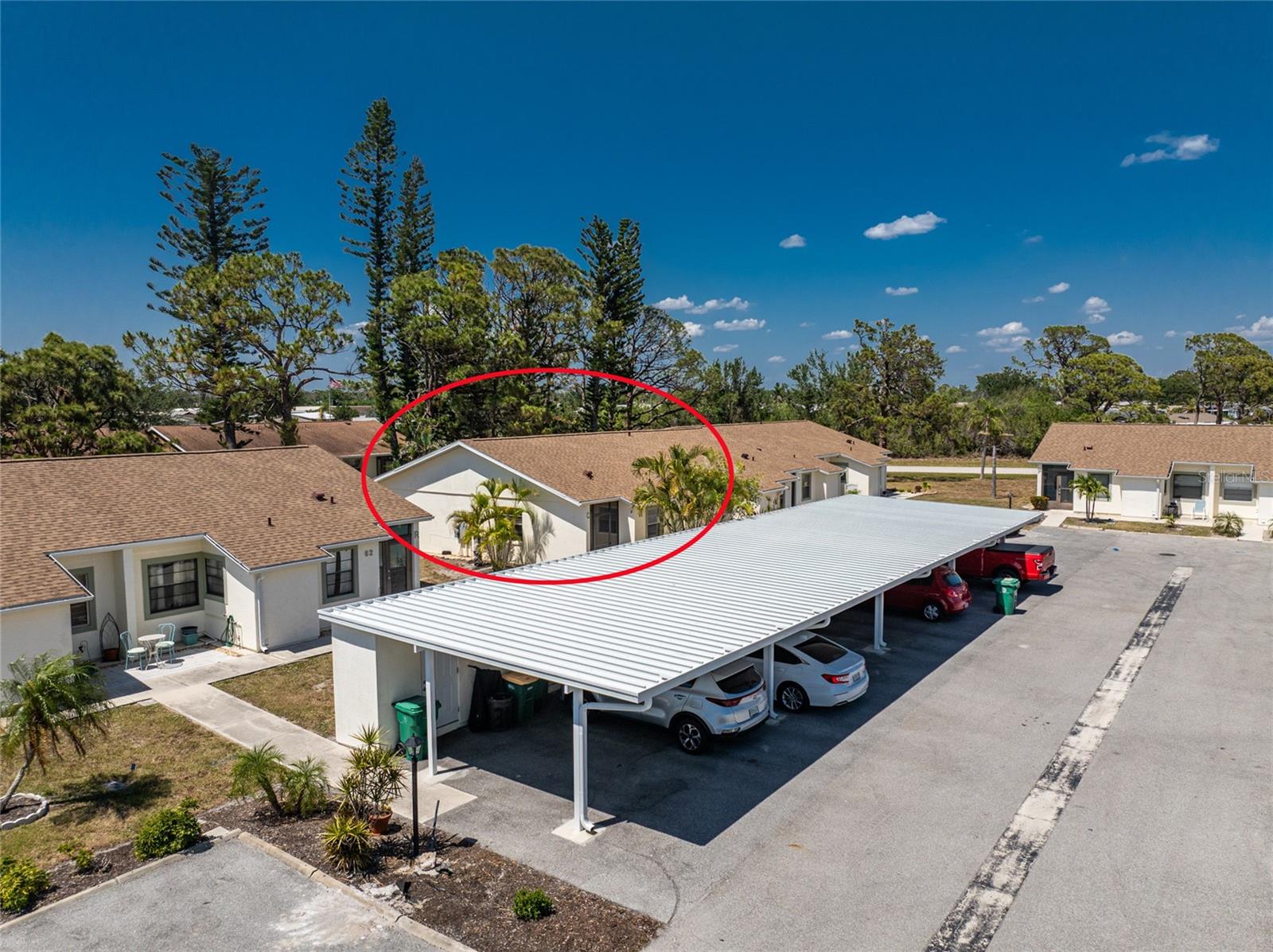 Aerial 2 - carport assigned to this unit is about midway in the row of carports - 6796 GASPARILLA PINES BLVD #63, ENGLEWOOD