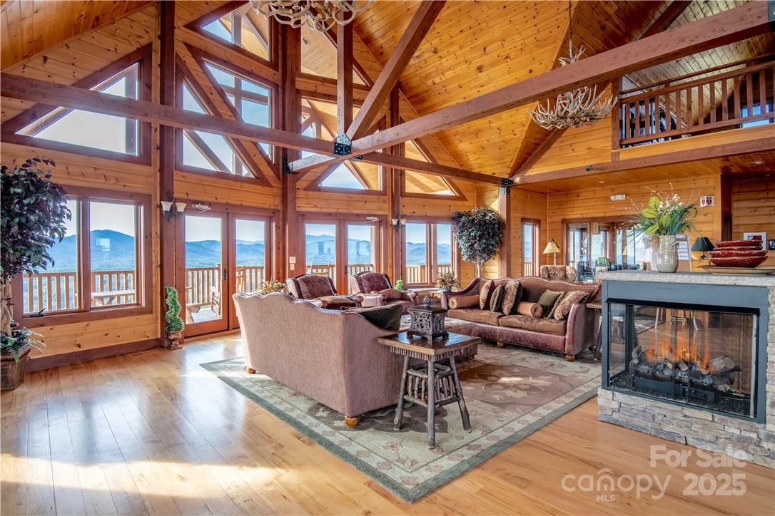 Pisgah Lodge is beautifully appointed with locally manufactured furniture, a 3 sided fireplace, reading room, full kitchen, and a pool table in the loft - 1.85 acres Lot 154 Rocky Falls Lane, Lenoir