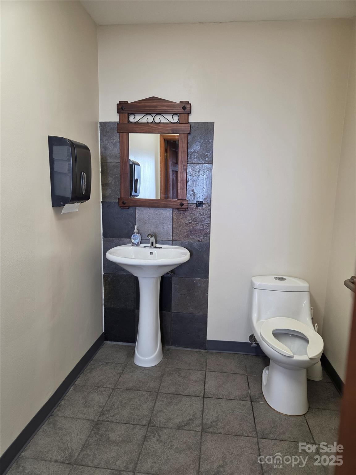 Men's Restroom - 5513 Monroe Road, Charlotte