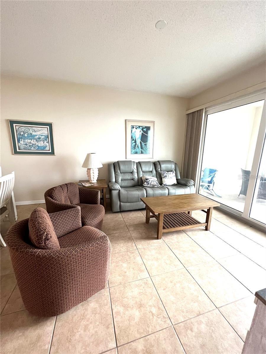 Living room area- SLiders to Baclony - 104 SURFVIEW DR #2503, PALM COAST
