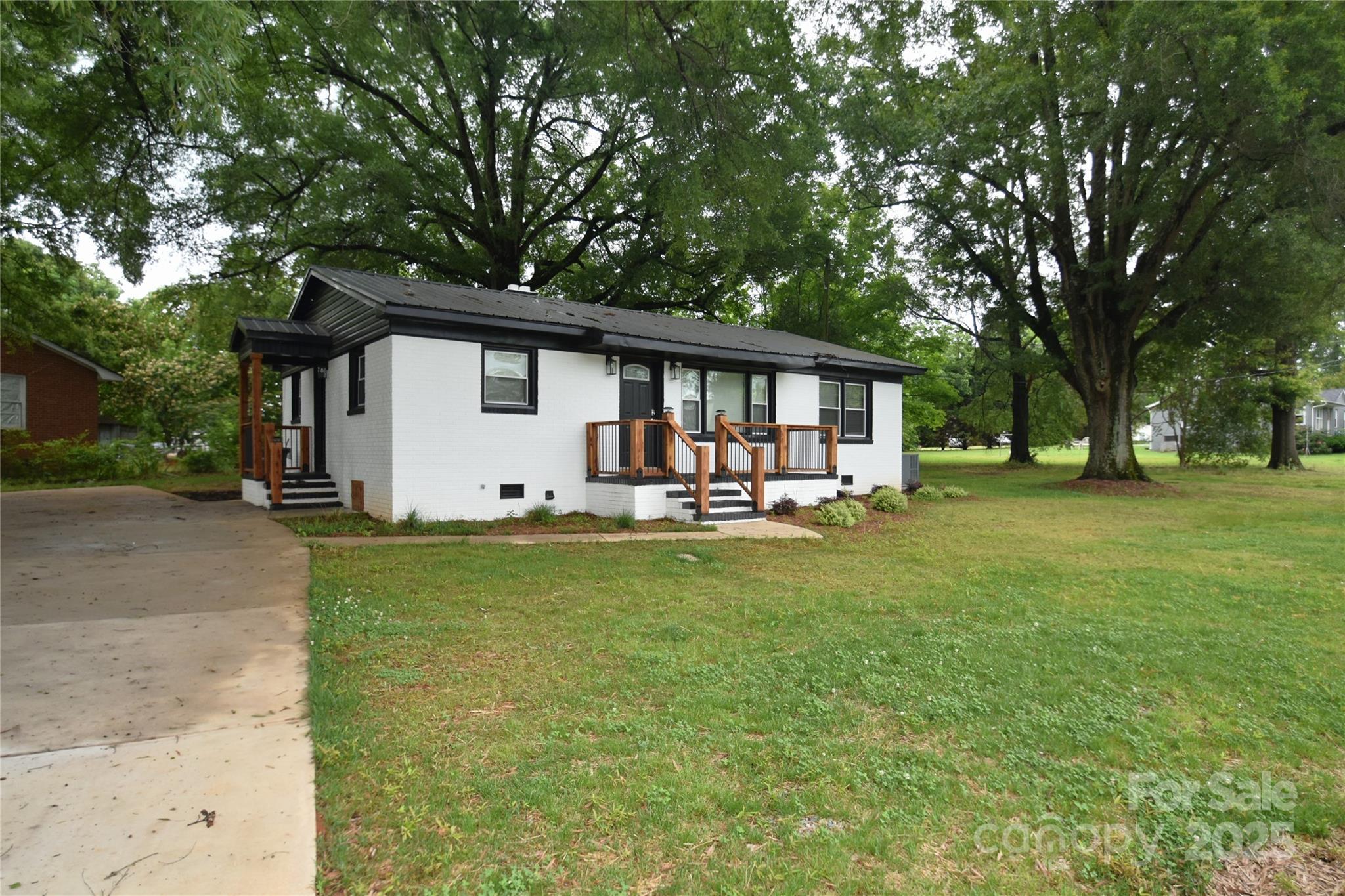 Featuring Three Huge Oak Trees that include a nice brick ranch. - 706 Mcintyre Street, Monroe