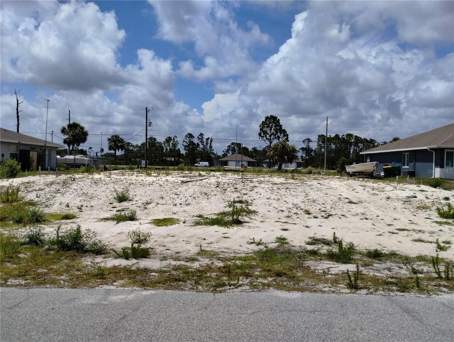 Front view of cleared lot w/fill dirt - 11320 POPLIN AVE, ENGLEWOOD