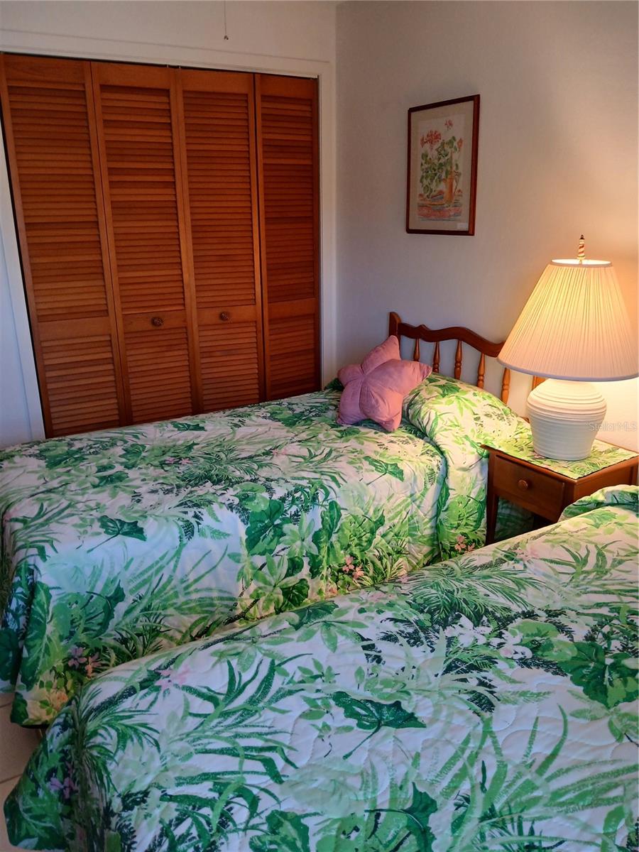 SECOND BEDROOM CLOSET - 6050 CHESHAM DR #3, NEW PORT RICHEY