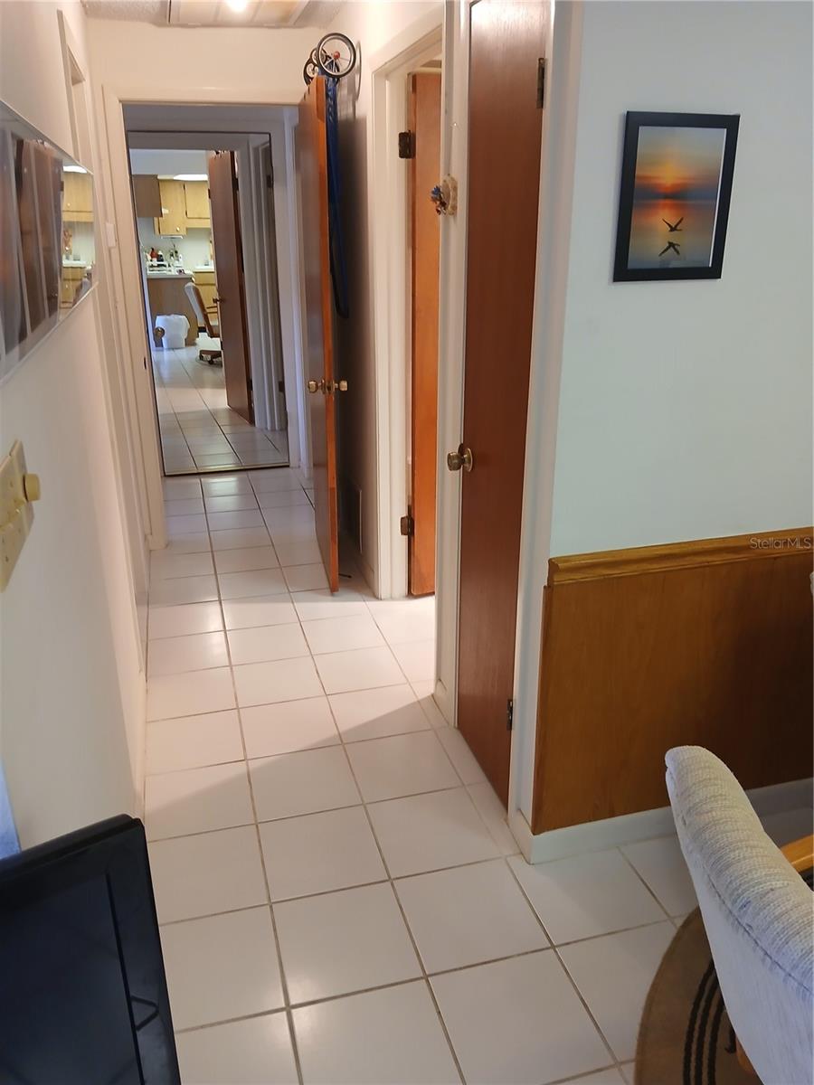 HALLWAY TO BEDROOMS - 6050 CHESHAM DR #3, NEW PORT RICHEY