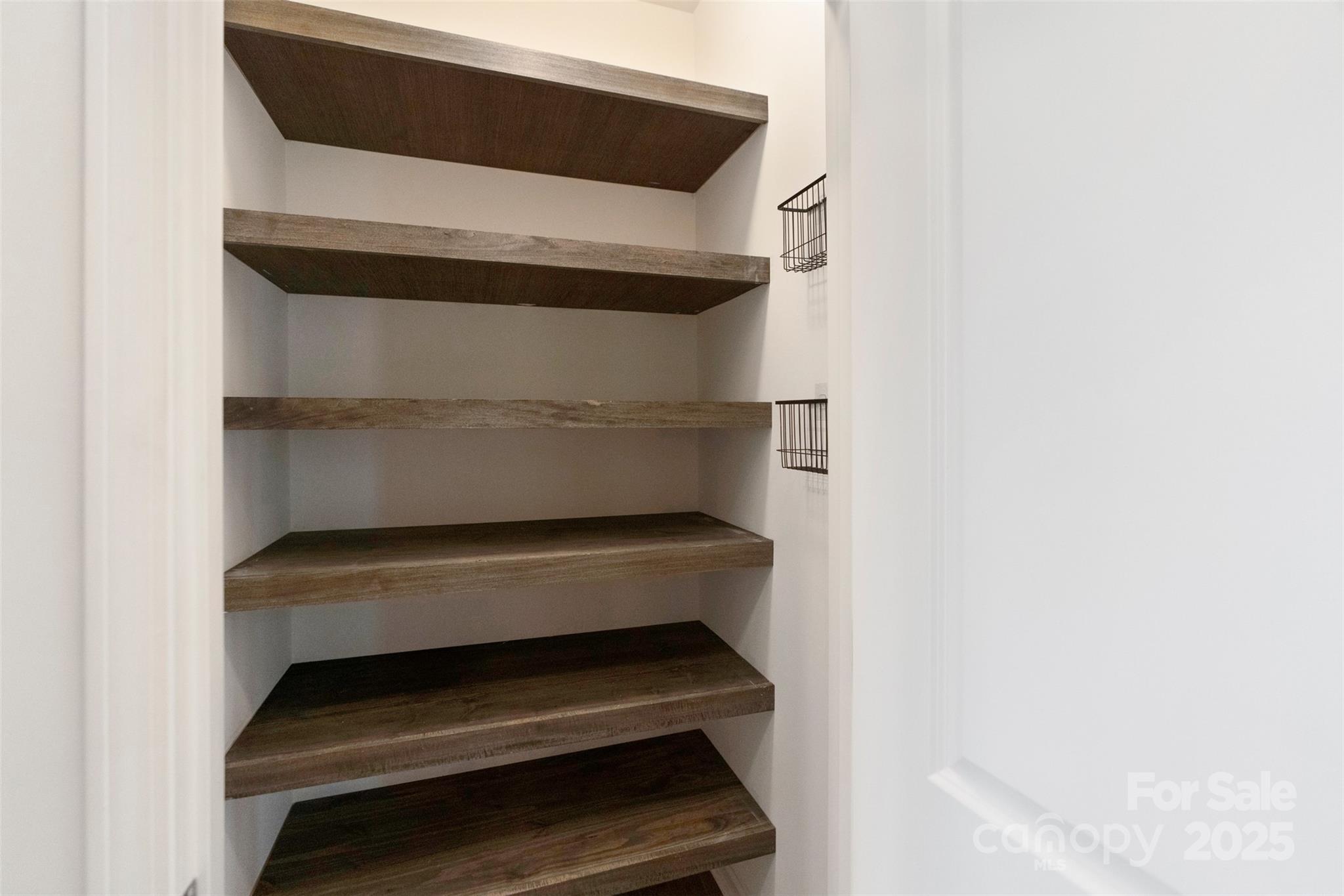 Upgraded custom shelving in pantry - 117 Carmine Court, Troutman