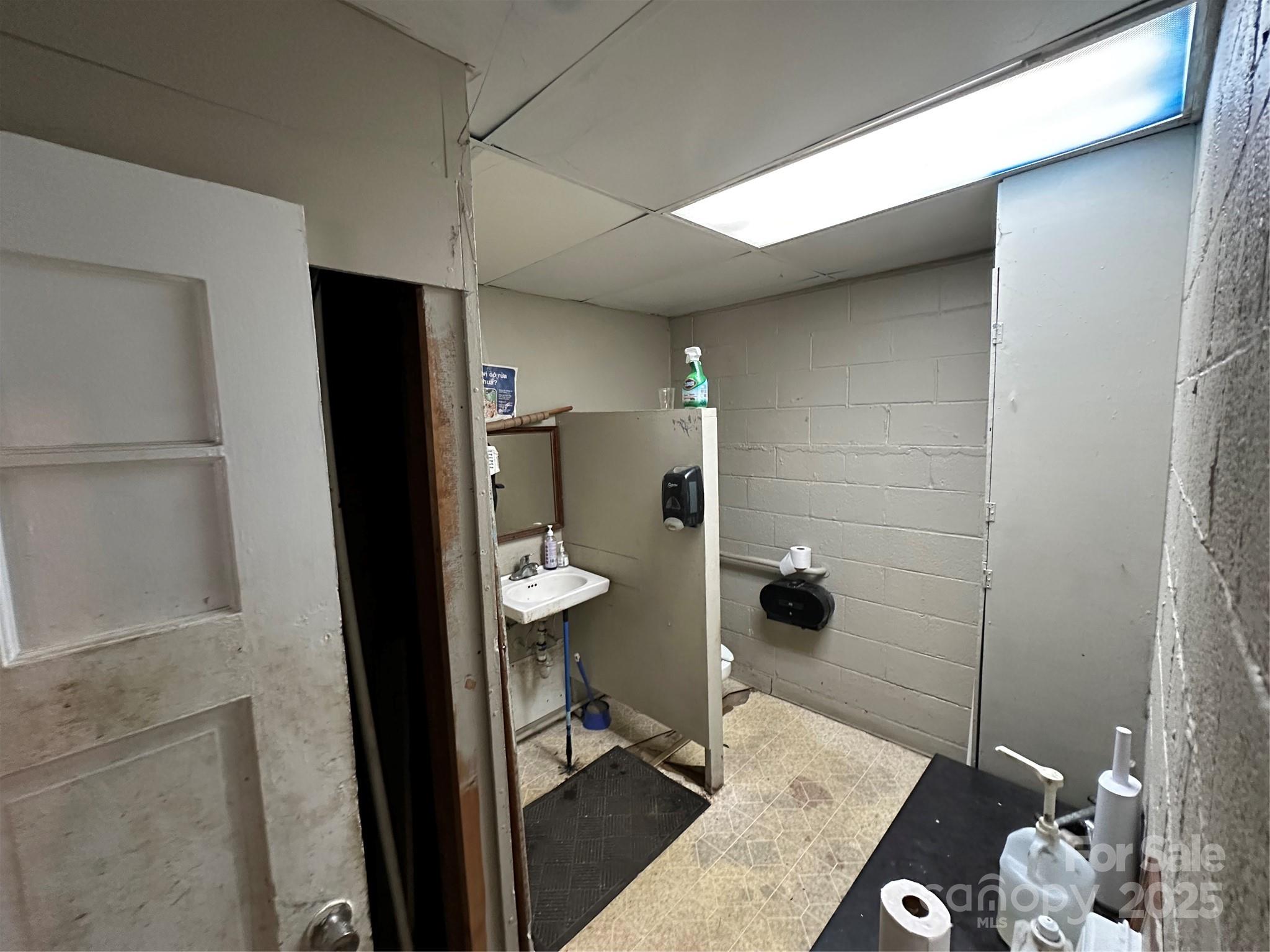 Men's Bathroom - 410 E Fleming Drive, Morganton