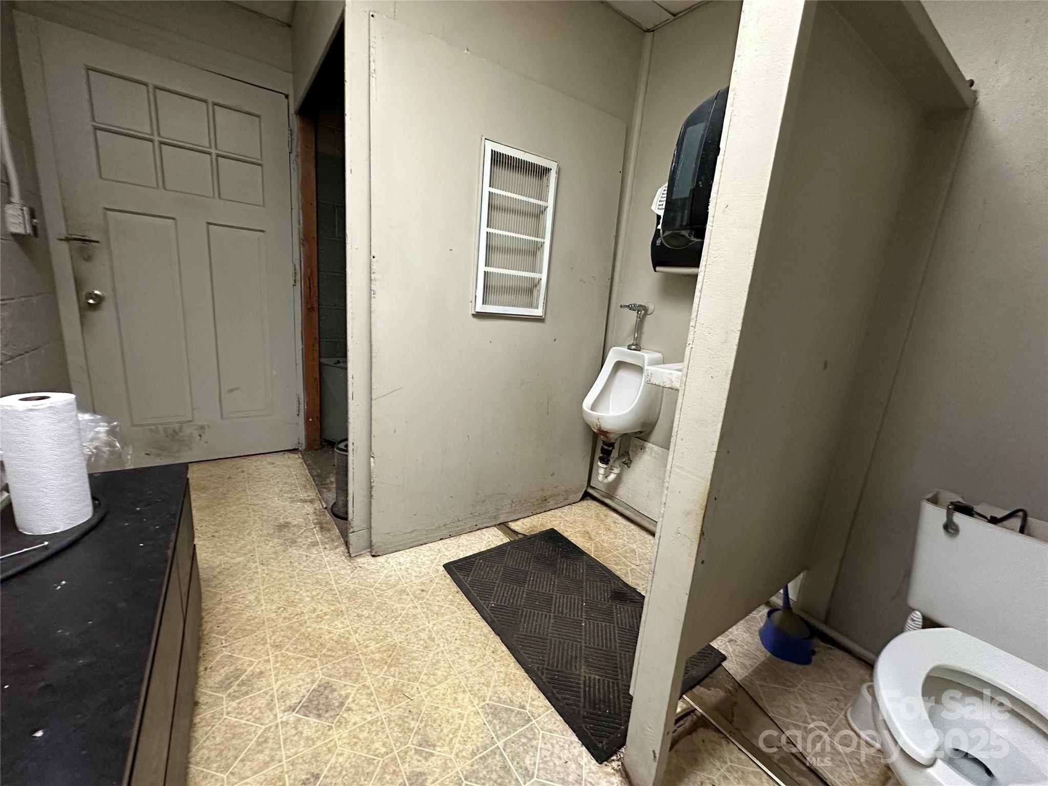 Men's Bathroom - 410 E Fleming Drive, Morganton