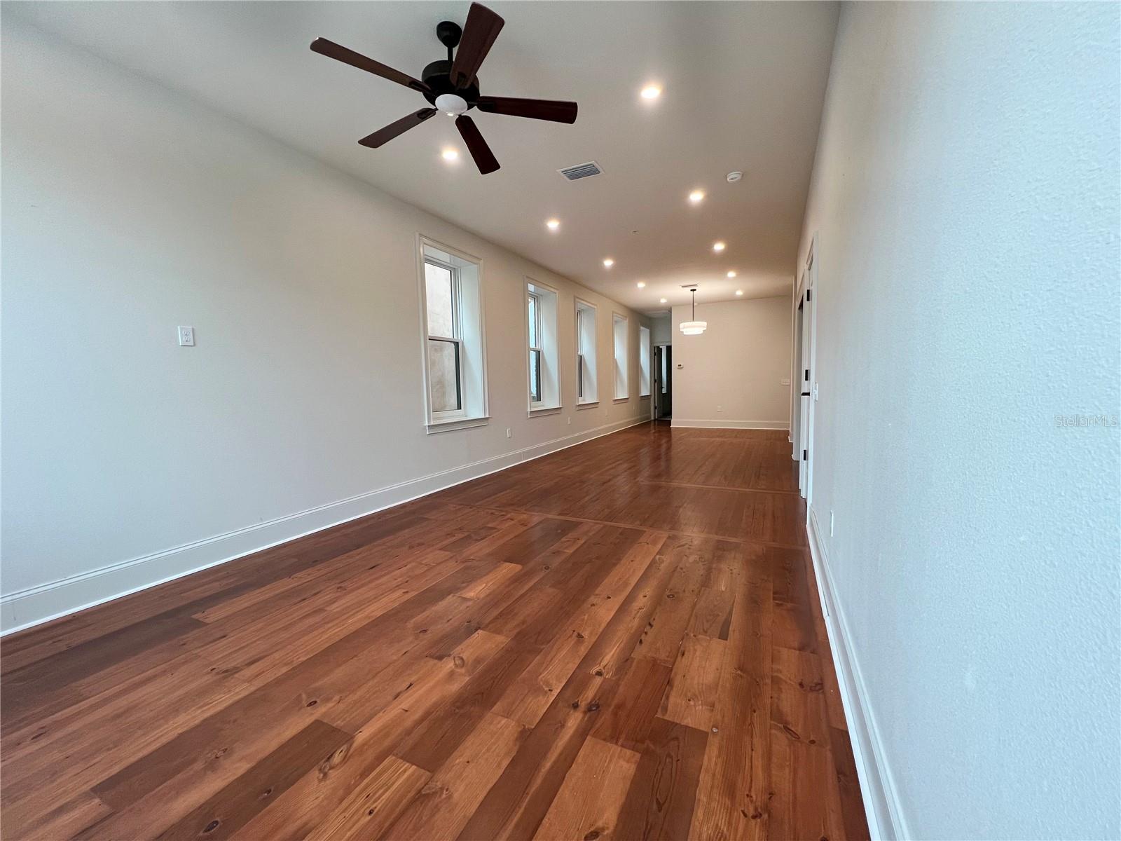 Unit 201 Living Room looking towards back bedroom - 244 E PARK AVE, LAKE WALES