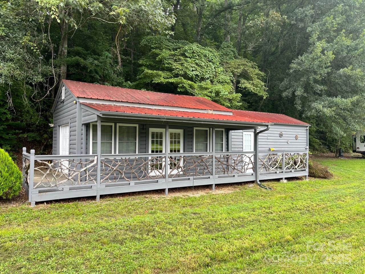 No restrictions and open use zoning allows many uses. - 1961 Cane Creek Road, Fletcher