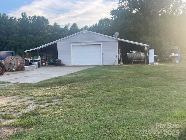 Workshop with outside storage. Enclosed portion is 50 X 24. Additionally has shed on both sides. - 3513 Gilboa Road, Marshville
