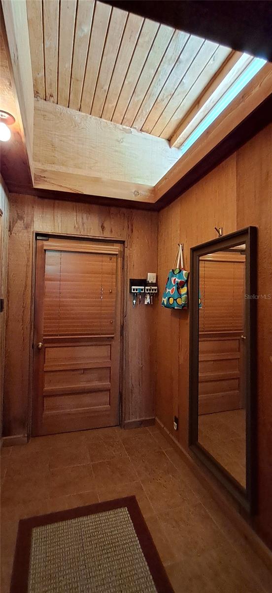 Hallway adjacent to the Laundry Room leading to the Garage. - 2741 EDWARDS RD, HAINES CITY