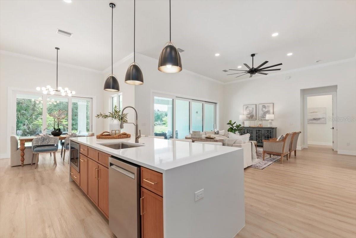 Kitchen Open to Living/Dining Areas - 17 OLD OAK DR N, PALM COAST