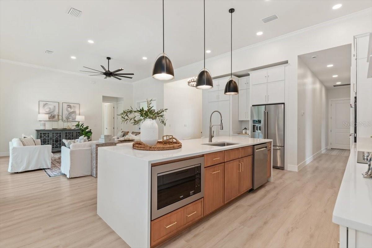 Kitchen Open to Living/Dining Areas - 17 OLD OAK DR N, PALM COAST