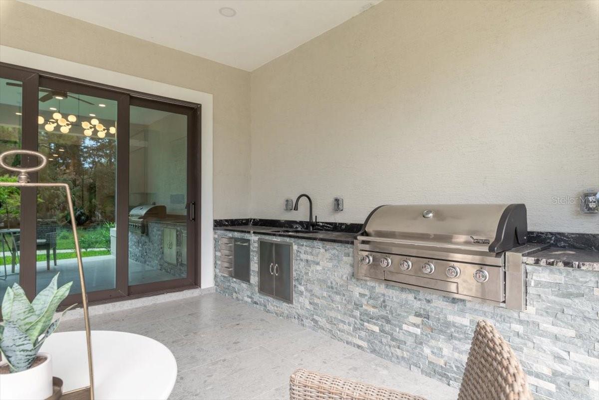 Expansive Lanai with Outdoor Kitchen - 17 OLD OAK DR N, PALM COAST