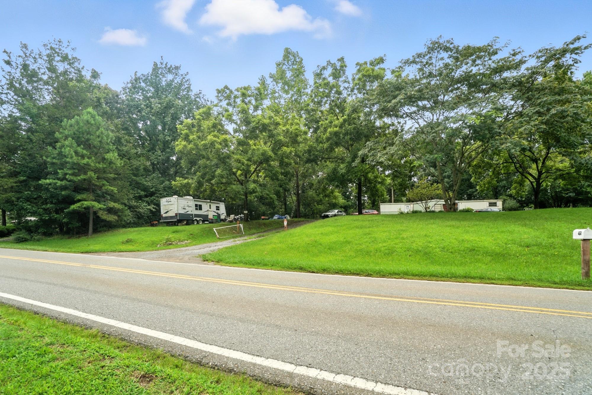 Another view of subject street and view of lot - 450 Dixon School Road, Kings Mountain